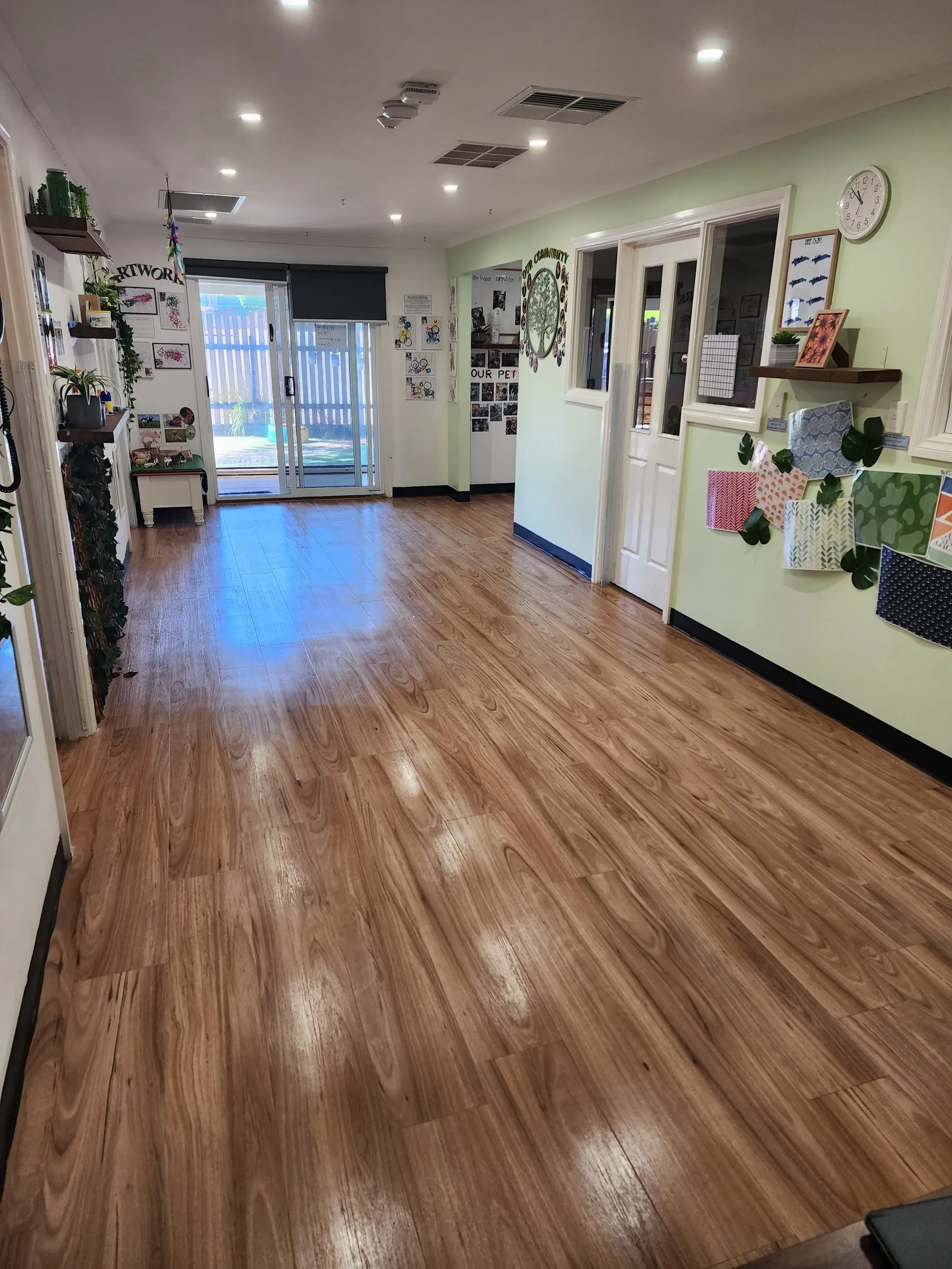Childcare centre hall with a clean timber-look floor