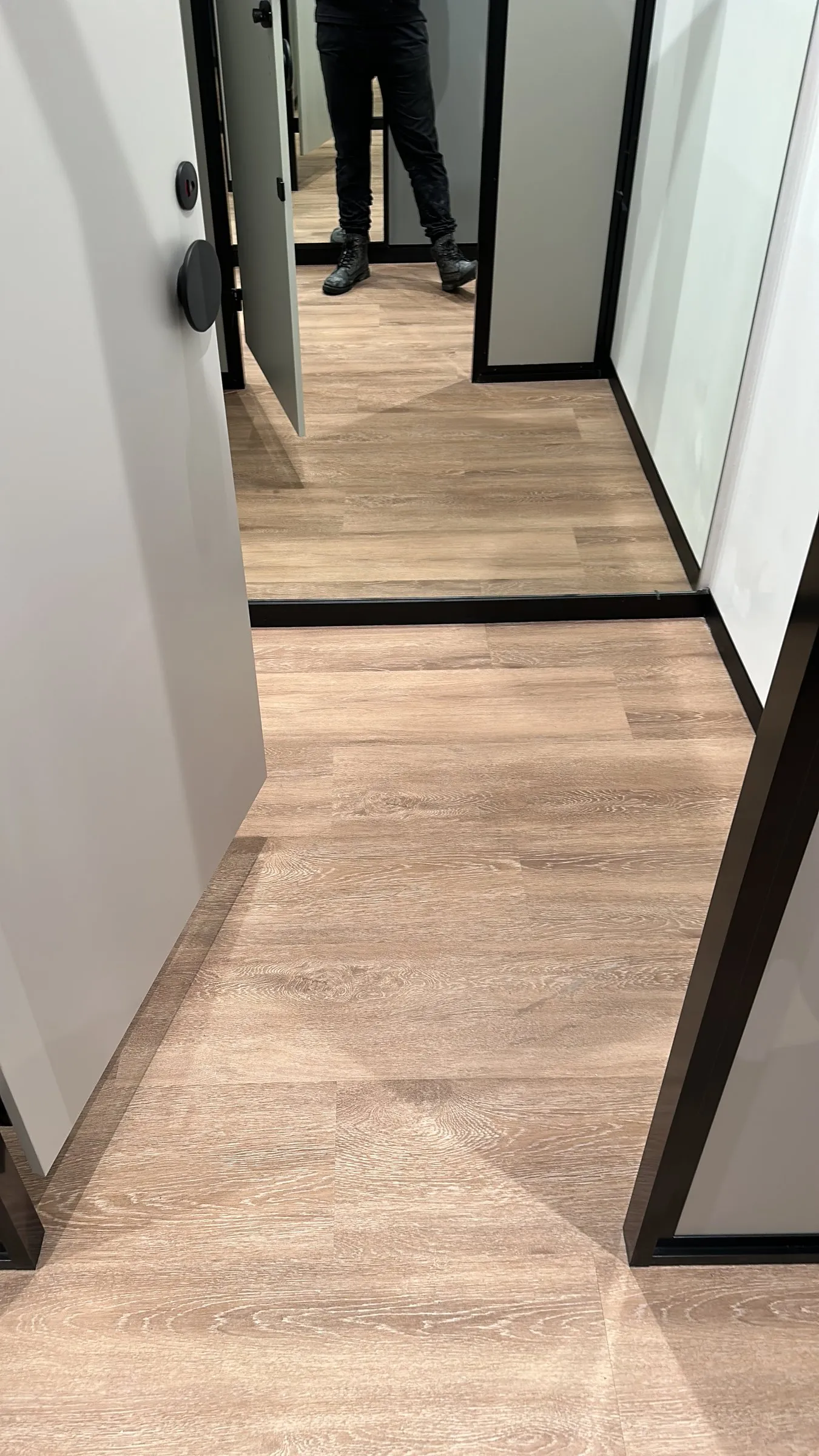 Office corridor with a timber-look floor after a clean
