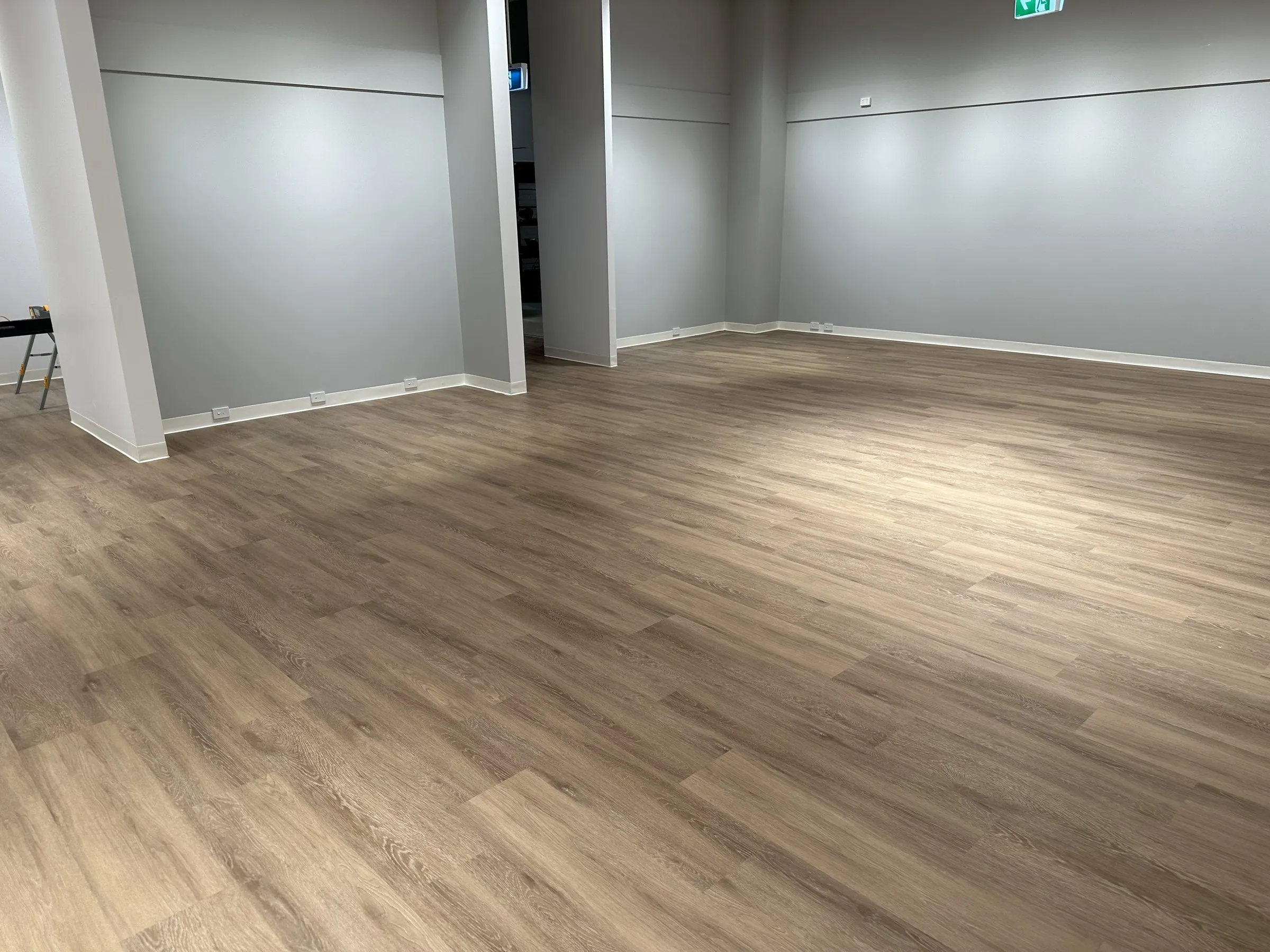 Large empty fit-out floor plate with pillars after the final clean