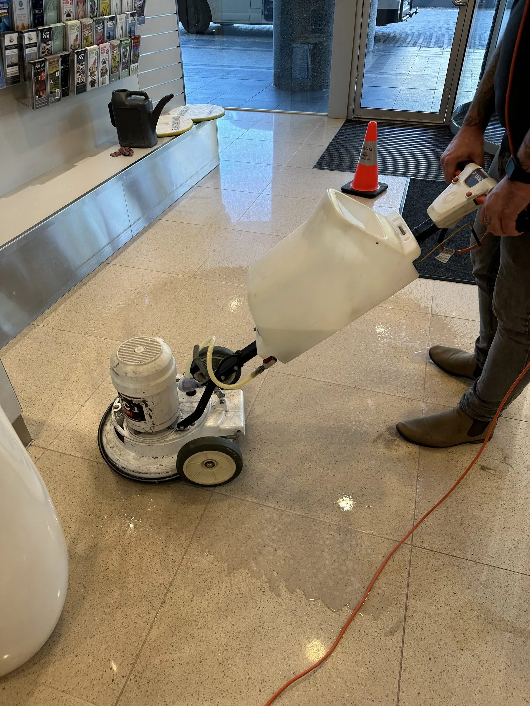 Rotary floor machine on a JC floor-care job