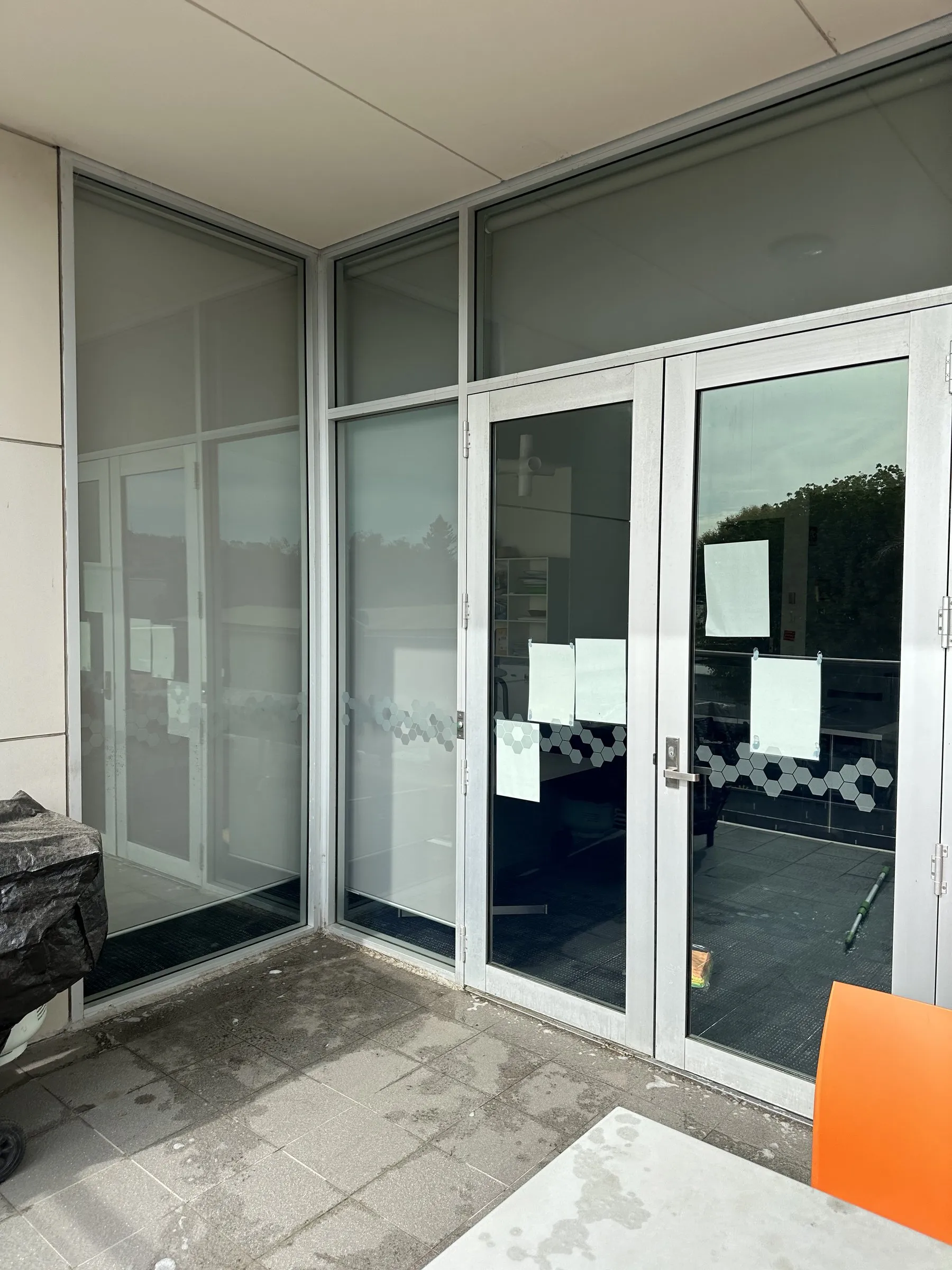 Glazed office entry doors after a clean